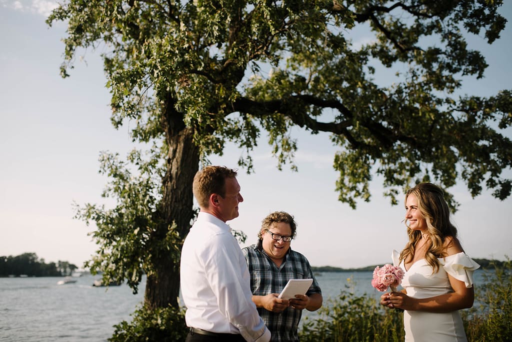 couple elopes beside lake minnetonka in excelsior